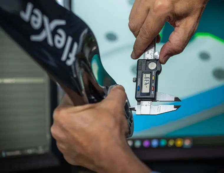 Digital calipers on a finished blade.