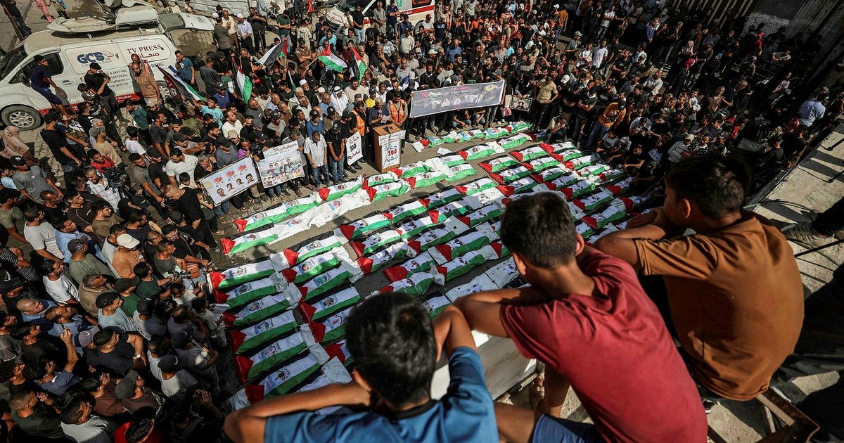 Mass Funeral Held in Gaza as Dozens of Remains, Including Children, Are Recovered