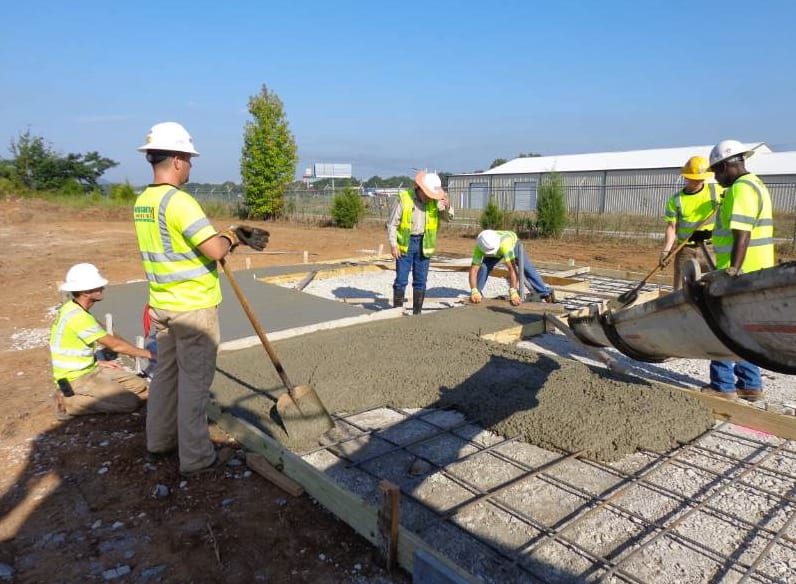 image d'une équipe de béton