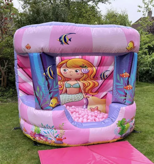Mermaid Shell Inflatable Ball Pit, a soft play set for hire from Jaimie's Castles