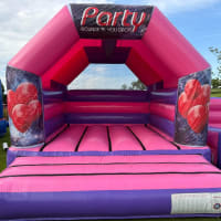 Wide Pink And Purple Bouncy Castle 12ft X 15ft