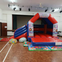 Gabbys Dollshouse Red And Blue Side Slide Bouncy Castle