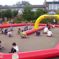 Wiggle Cars And Inflatable Race Track