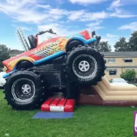 Monster Trucky Bouncy Castle Slide Combo