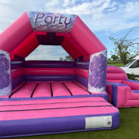 Wide Pink And Purple Bouncy Castle 12ft X 15ft