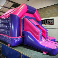 Pink And Purple Front Slide Combi Castle