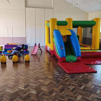 Multicoloured Inflatable Activity Castle With Slide