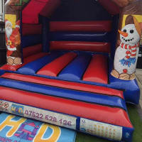 Christmas Red And Blue Bouncy Castle