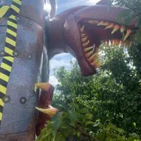 T Rex Bouncy Castle With Front Slide