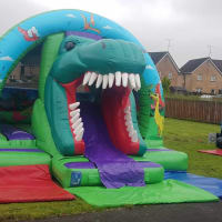 Dinosaur Circle Bounce And Slide Castle 18ft X 15ft