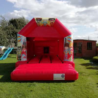 Red Super Hero Disco Bouncy Castle