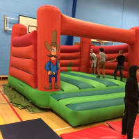 18ft By 18ft Western Theme Adult Bouncy Castle