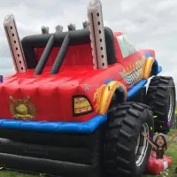Monster Trucky Bouncy Castle Slide Combo