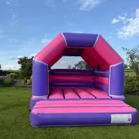 Wide Pink And Purple Bouncy Castle 12ft X 15ft