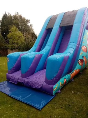 Bouncy Slide Safety. Feet First And Sit On Your Bum