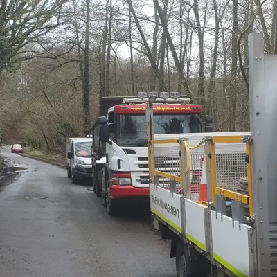 Rubbish Removal With Skip Hire Truck In Surrey