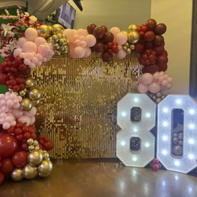 Party Backdrop And Balloons In London For An 80th Party, Sequin Wall Led Numbers And Balloon Arch