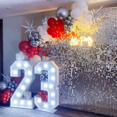 Silver Sequin Well With Balloon Arch And Neon Signage For A Prom In Bexleyheath By Deluxe Flower Walls