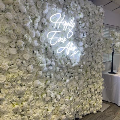 Ivory White Flower Wall With Neon Signage At A Wedding In Sidcup By Deluxe Flower Walls