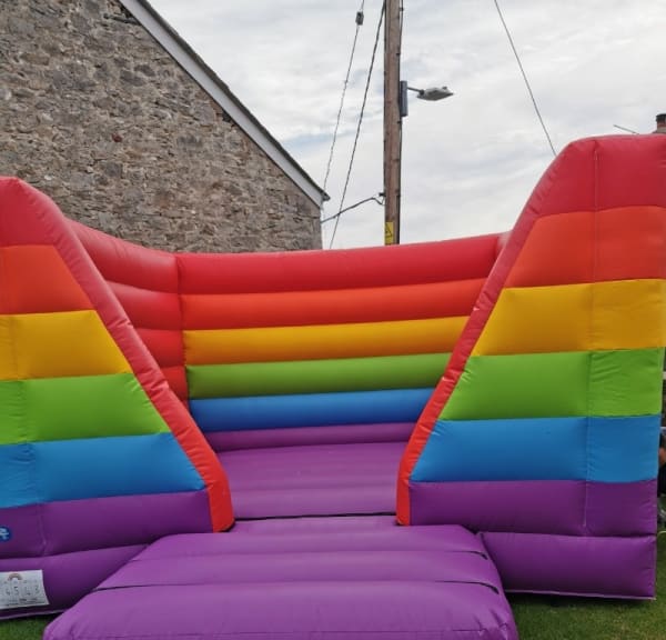 Rainbow Bouncy Castle Hire my love events