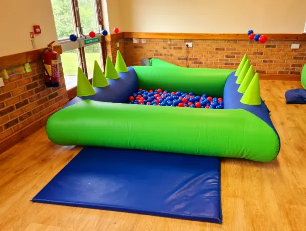 Blue And Green Ball Pit And Air Juggler