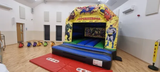 Super Heros  Bouncy Castle And Wiggle Cars