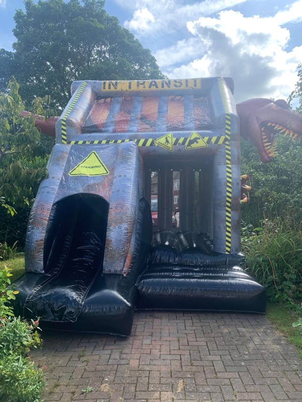 T Rex Bouncy Castle With Front Slide
