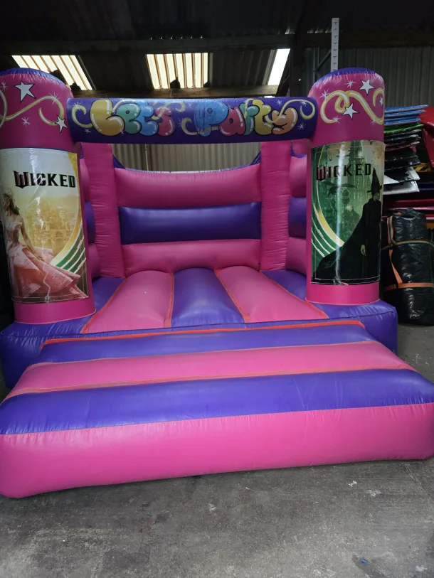 Pink And Purple Wicked H Frame Bouncy Castle