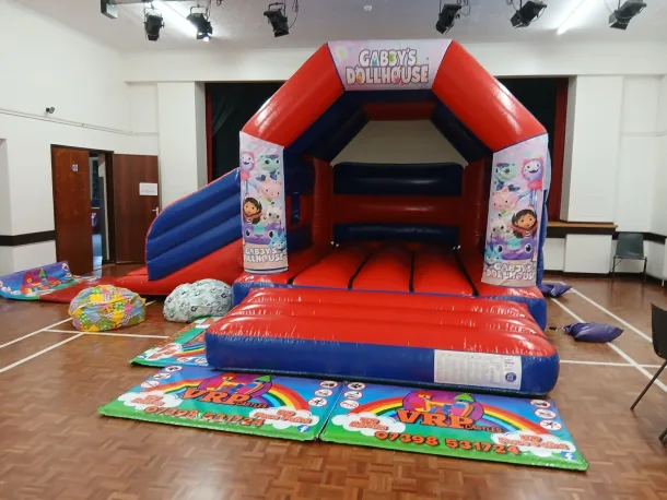 Gabbys Dollshouse Red And Blue Side Slide Bouncy Castle