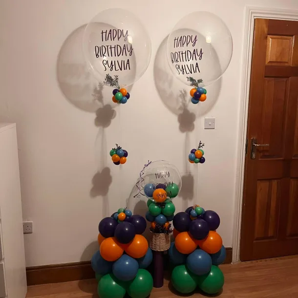 Birthday Package. 2 Flower Filled Bubble Balloon And Table Centrepiece