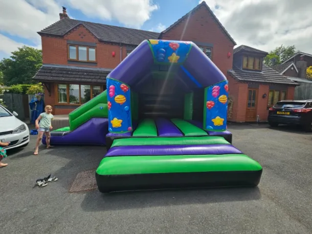 Lets Party Green And Purple Disco Side Slide Combi Bouncy Castle