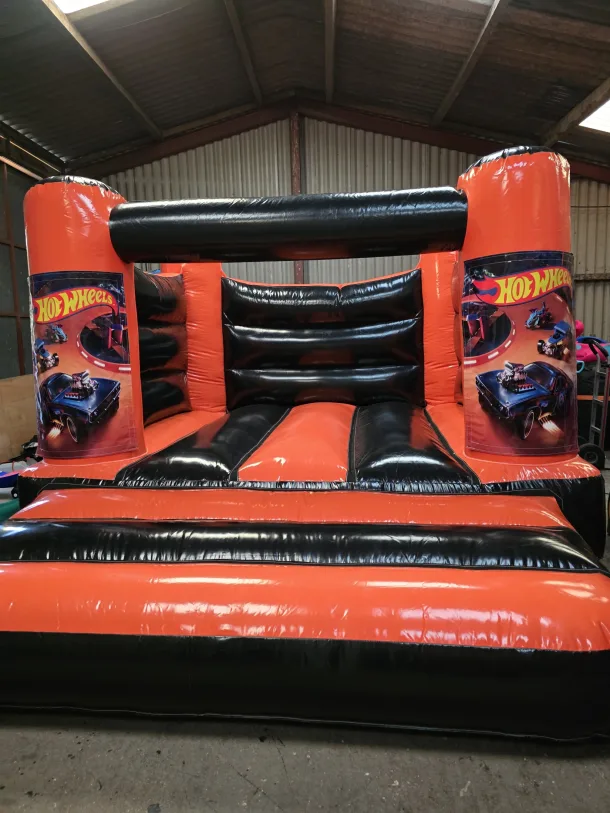 Orange And Black Hotwheels H Frame Bouncy Castle
