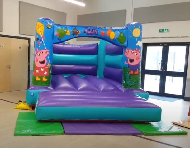 Piggy Bouncy Castle Set Up In A Garden In Bourne South Lincolnshire