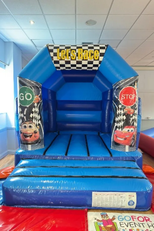 Blue Low Height Junior Castle With Racing Graphics