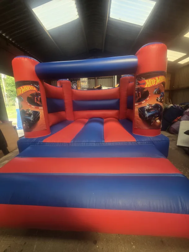 Red And Blue Hotwheels H Frame Bouncy Castle