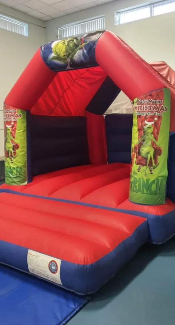 Red And Blue Grinch Bouncy Castle