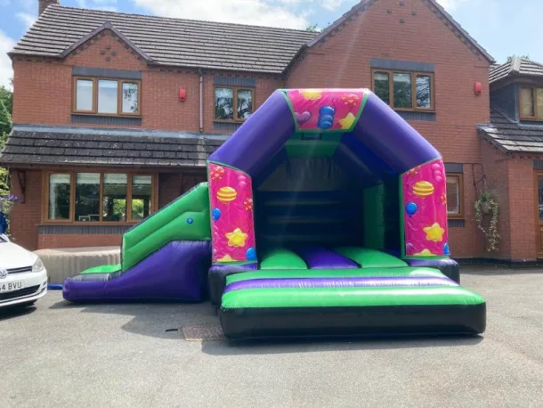 Pink Lets Party Green And Purple Disco Side Slide Combi Bouncy Castle