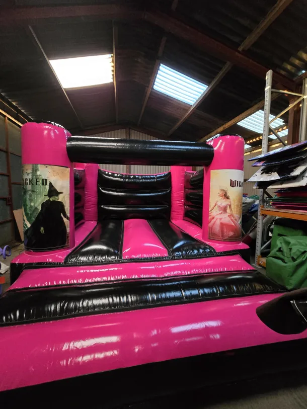 Pink And Black Wicked H Frame Bouncy Castle