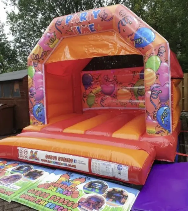 Orange Party Time Bouncy Castle