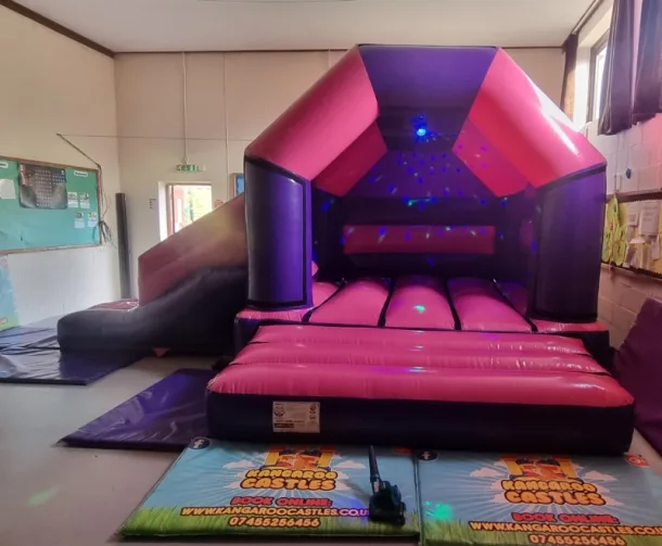 Pink And Purple Disco Side Slide Combi Bouncy Castle