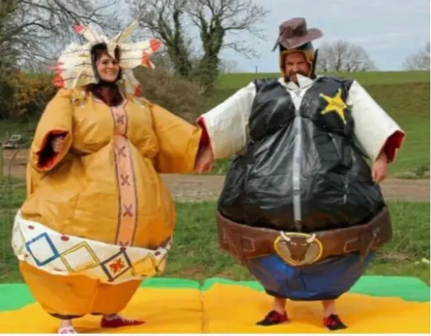 Western Sheriff And Indian Sumo Suit Hire