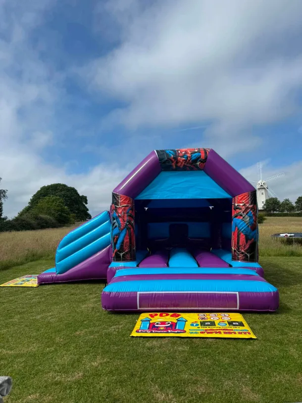 Hero Themed Blue And Purple Castle Bounce And Slide