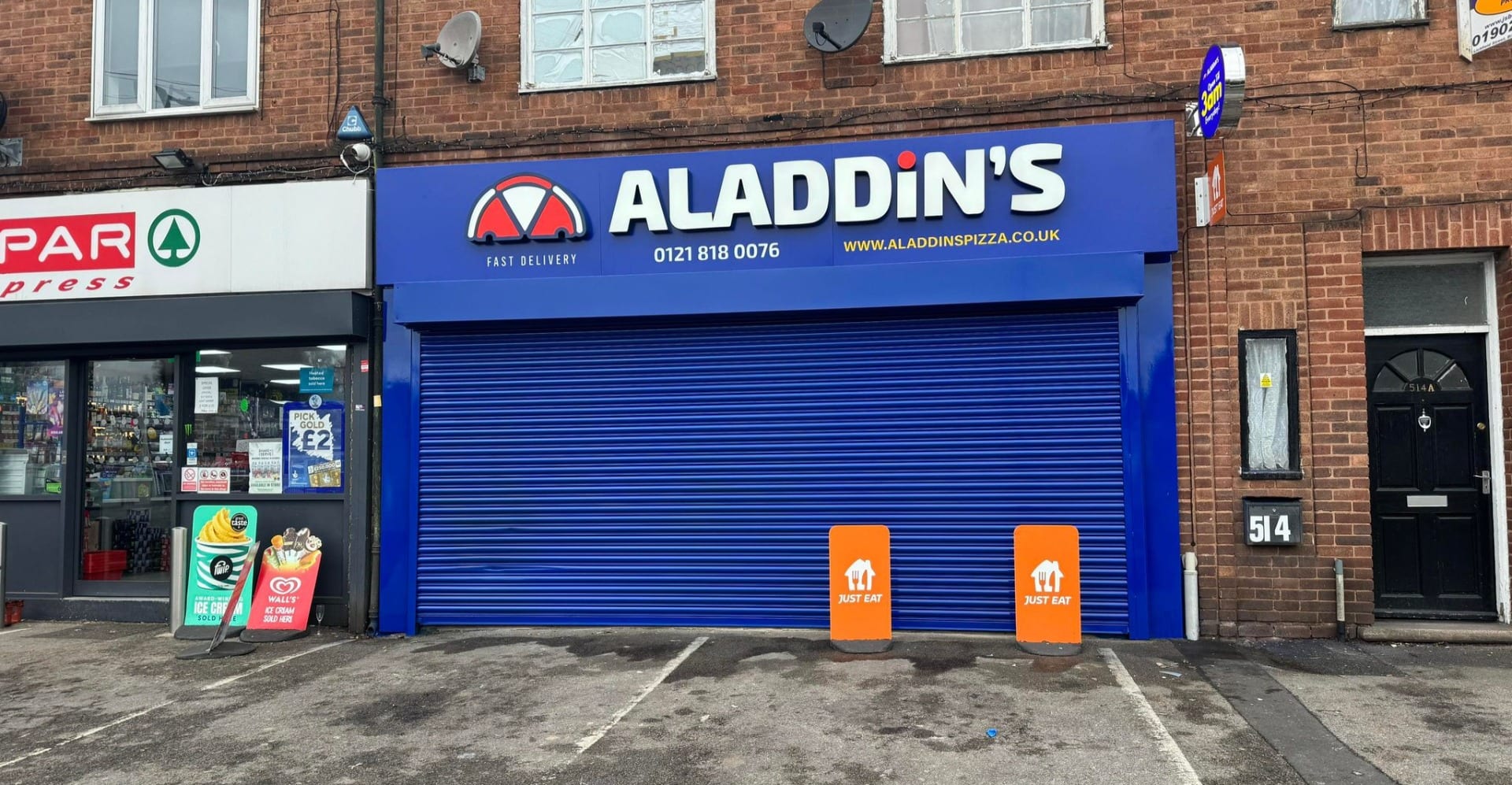 the pizza takeaway shop front after painting and decorating