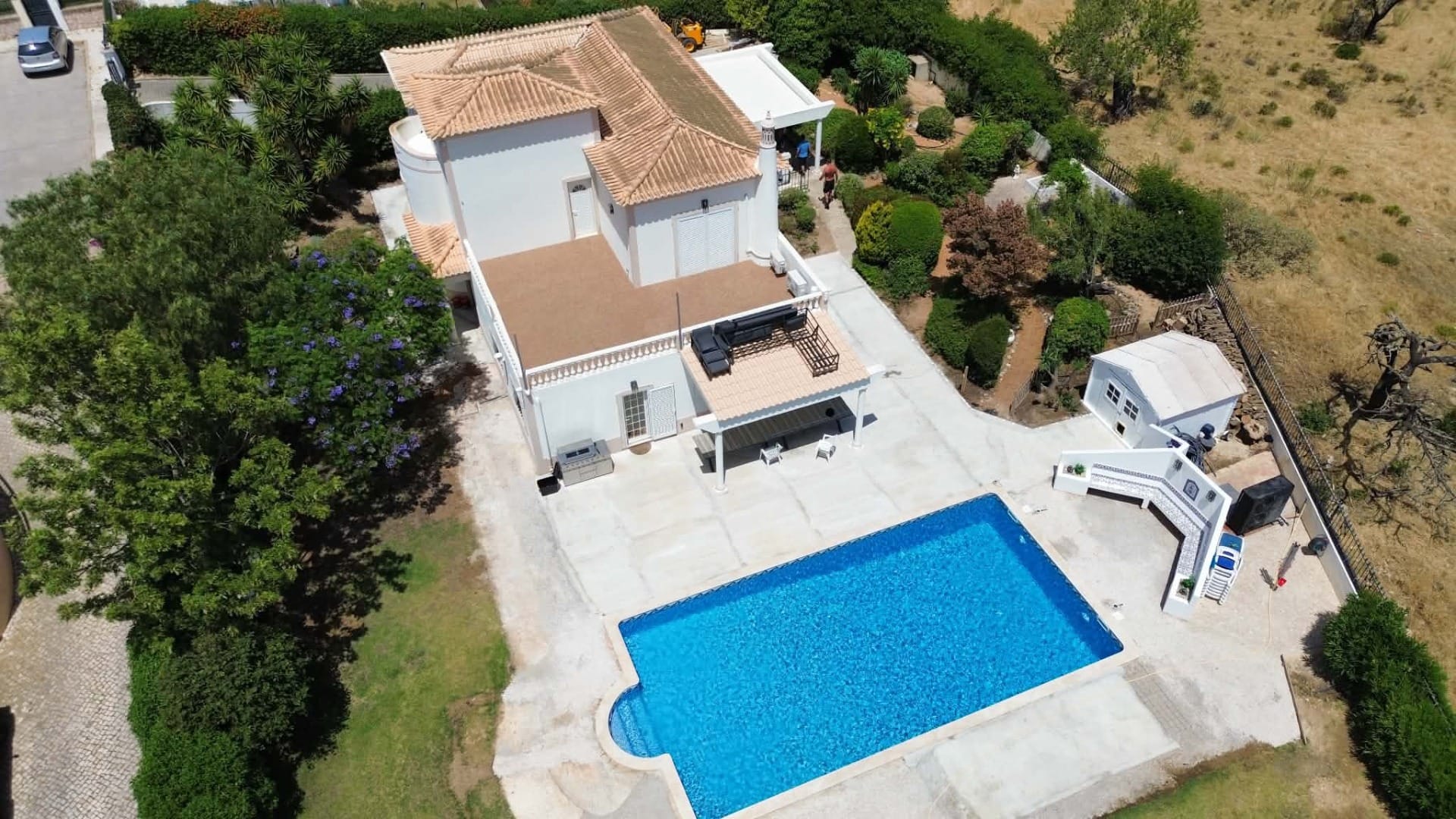 Villa in Albufeira, Algarve, Portugal before Bespoke Resin transformed the concrete swimming pool surround, pathways and outdoor areas.