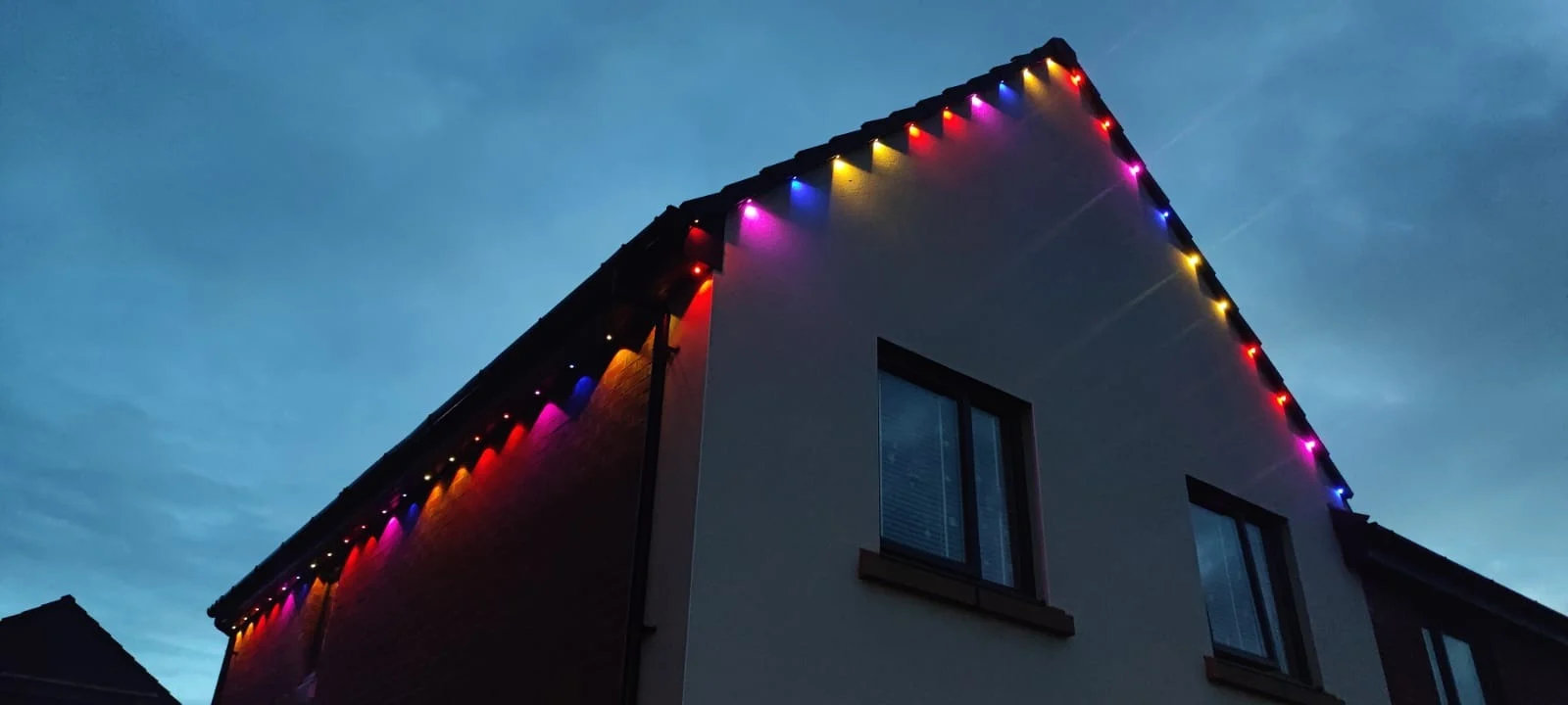 House with Christmas lights Telford - Aqua Glaze