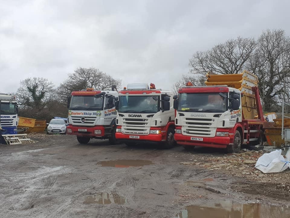 Trucks delivering skips across Surrey and Sussex