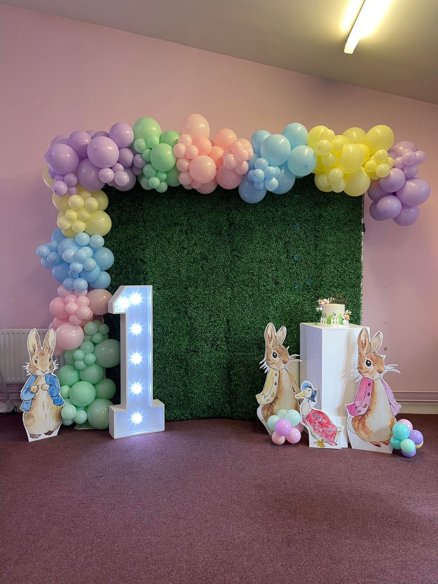  Child's birthday backdrop with balloon arch and led number