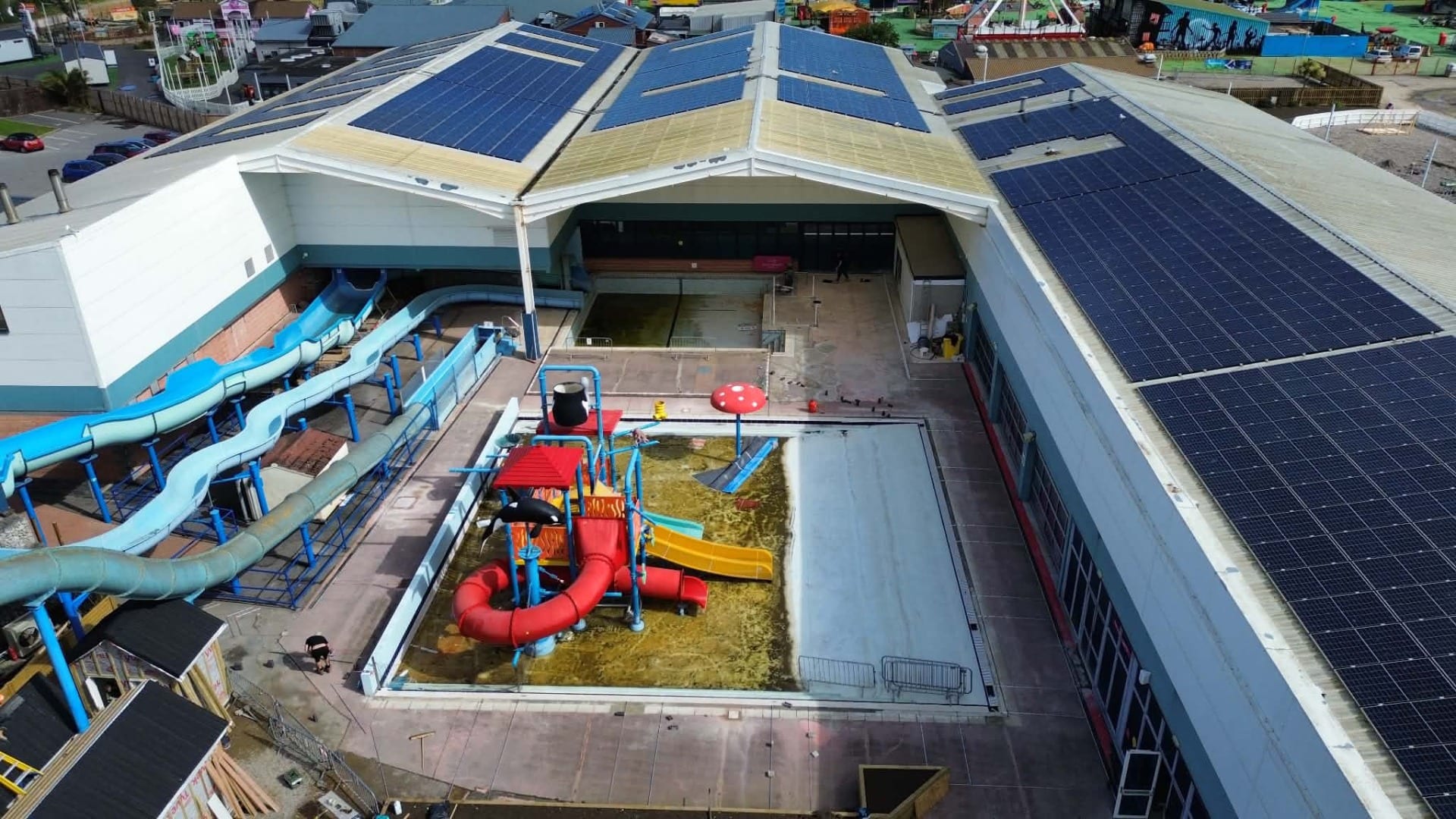 Splash park at Unity Holiday Park in Somerset before installation of the blue and white resin bound surfacing