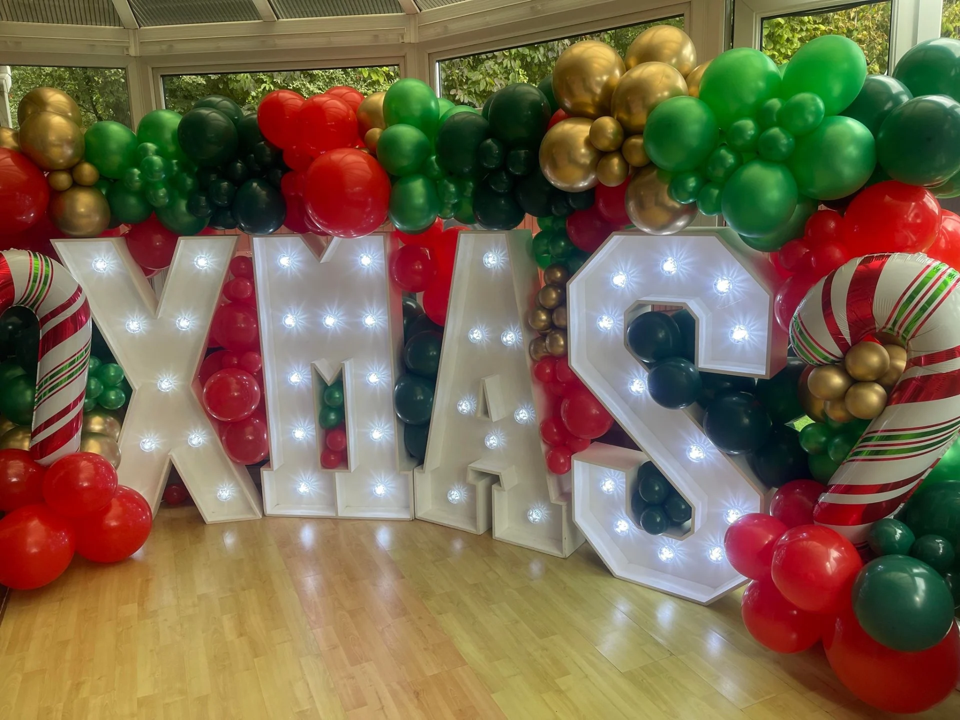 Christmas LEDs and balloon wall to hire