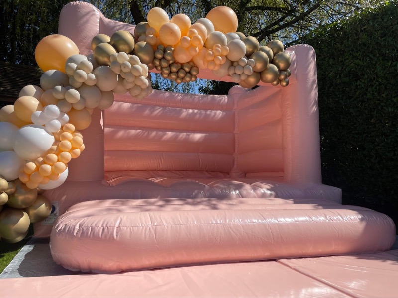 Pastel Peach Bouncy Castle Abi's Entertainments Bouncy Castle Hire